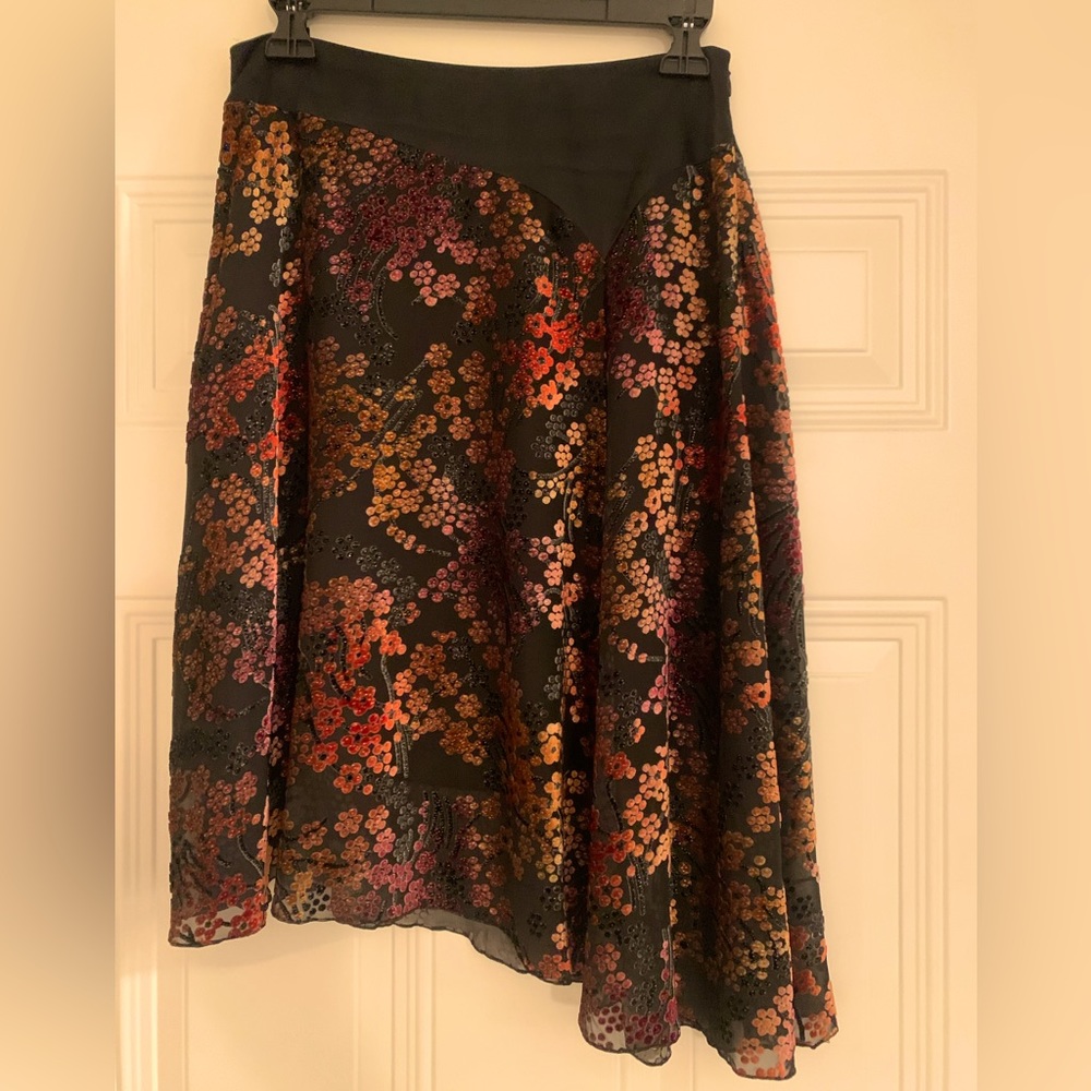 Trina Turk asymmetrical mid length silk skirt.